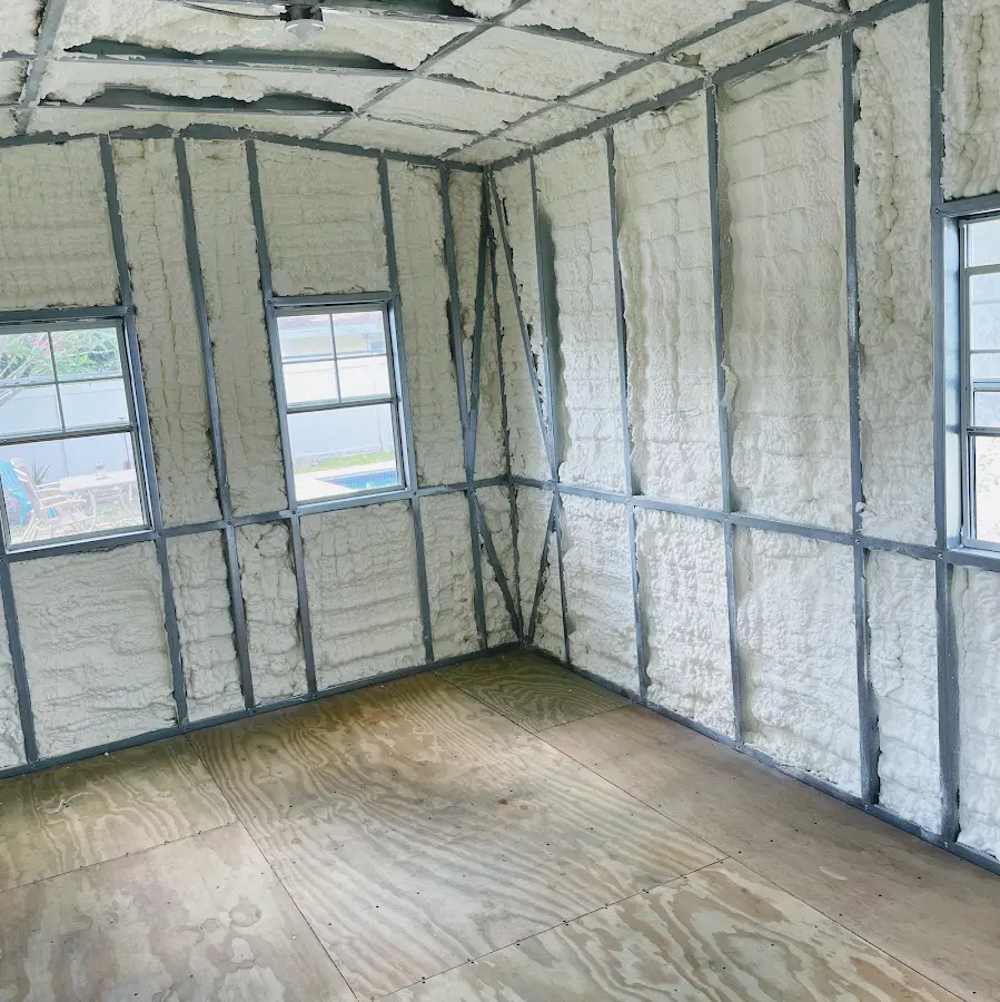 Closed-cell spray foam insulation applied to wall cavities in a residential project in Northville